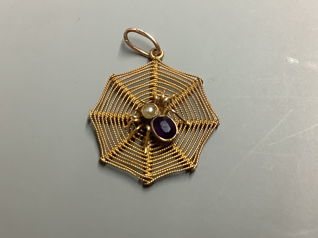 A 9ct, amethyst and seed paerl set 'spider in web' pendant